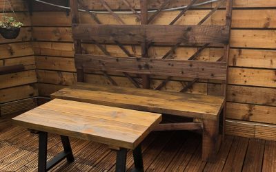 The garden wooden set: pergola, bench, and coffee table.